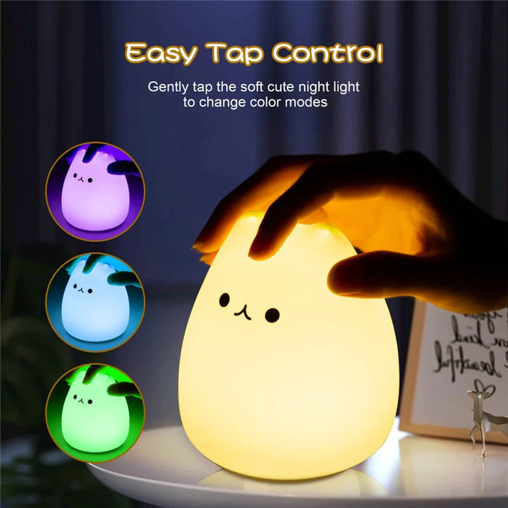 White cat-shaped silicone LED night light.