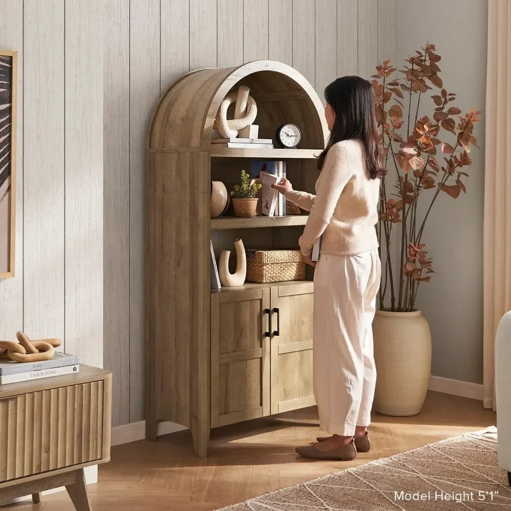 Front view of a short arched cabinet with five-tier arched bookcase and elegant storage doors.