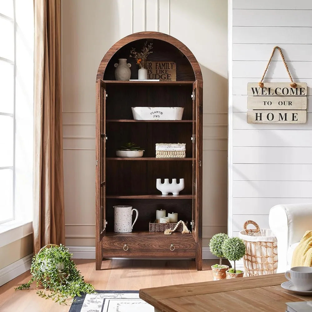 Farmhouse-style arched cabinet with open doors, showcasing adjustable shelves and storage space.