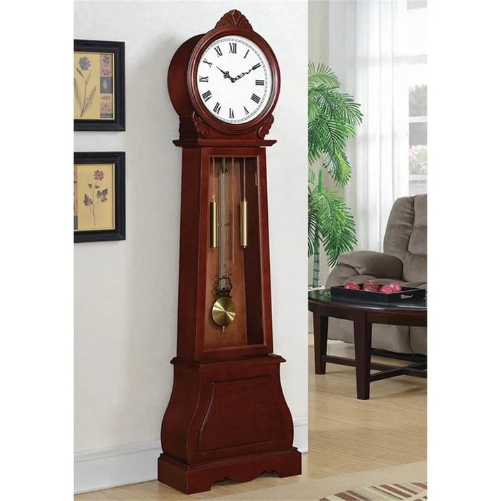 Grandfather clock with chime, brown-red finish, roman numerals, and brass pendulum.

