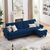 The L-shaped sectional sofa in blue, showing its elegant design, placed in a bright living room with a large window.