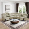 A spacious light beige leather sectional sofa with power reclining seats, built-in consoles with cup holders, and subtle blue LED lighting along the base. The sectional is showcased in a bright, classically styled living room with a round coffee table and patterned area rug.