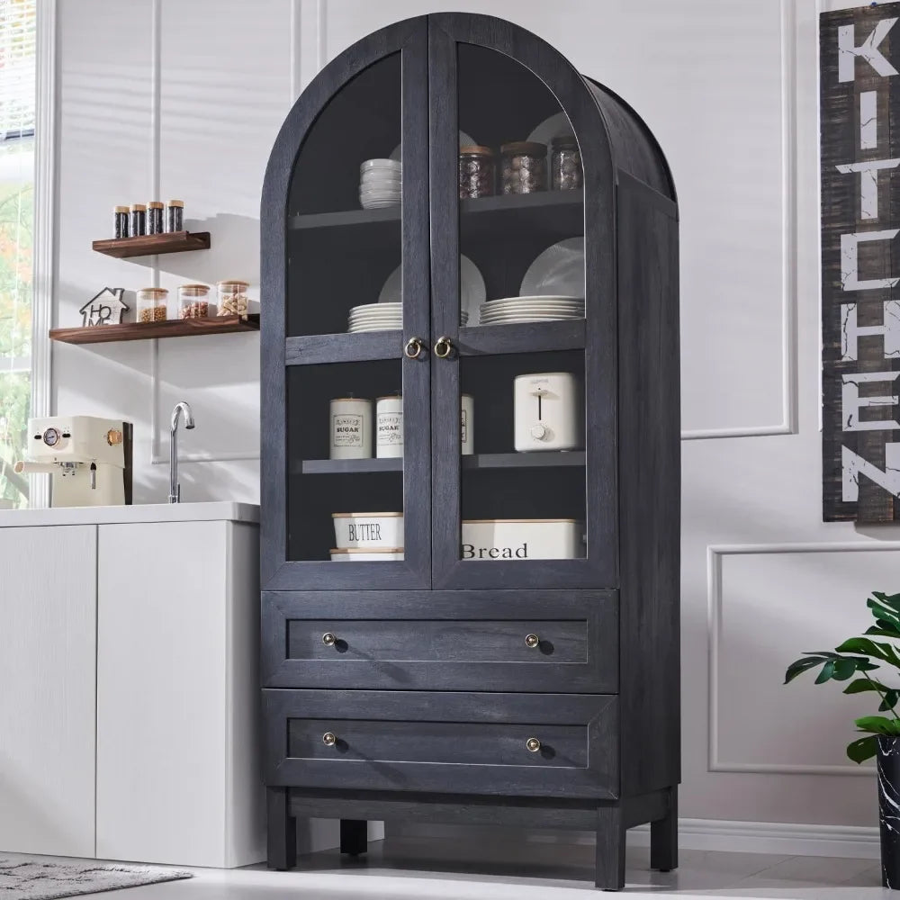 Front view of a 71-inch tall arched kitchen pantry cabinet in a dark wood finish with glass doors, two large drawers, and adjustable shelves for farmhouse-style kitchen storage.

