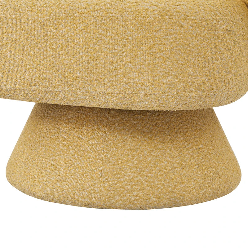 Close-up of the sturdy circular base on a yellow sherpa accent chair, highlighting its 360-degree swivel design and textured bouclé-style upholstery.

